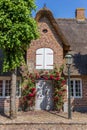 Front of a house with thatched roof in Mogeltonder Royalty Free Stock Photo