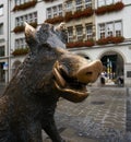 Close up of a bronze statue of a Wild Boar in the streets of Munich Germany