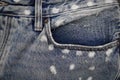Front jeans pocket with stitched threads closeup