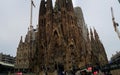 Front of the la sagrada de familia in Barcelona church cathedral under construction build crane entry stairs landmark