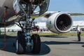 Front landing gear and turbofan Rolls-Royce Trend 900 of the newest airplane Airbus A350-900 XWB.