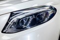 Front led headlamp view in the form of blue eyes of luxury very expensive new