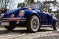 Front-left side view of navy blue classic convertible car Royalty Free Stock Photo