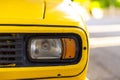 Front light details of an antique yellow car light details of an antique yellow car Royalty Free Stock Photo