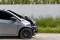 Front of light gray car big damaged and broken by accident on city street parking can not drive any more. With copy space for text Royalty Free Stock Photo