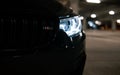 Front light of an Incredibly amazing jaw dropping metallic black BMW M3 CS m power sports car