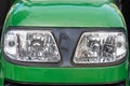 Front lighting bars of a small green tractor close-up Royalty Free Stock Photo