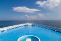 Front of cruise ship deck over looking ocean horizon