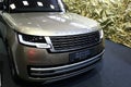 Front mask and lit LED day lighting on new british luxurious 4x4 SUV car Range Rover L460, beige metallic colour