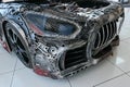Front mask and part of chassis of replica of grand tourer car Mercedes AMG GT R made from scrap metal
