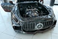 Front mask and part of chassis of replica of grand tourer car Mercedes AMG GT R made from scrap metal parts