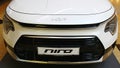 Front mask of second generation of korean compact hybrid crossover SUV KIA Niro in white colour