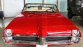 Front mask with twin vertical headlights of american full size car Pontiac Parisienne Convertible from year 1967