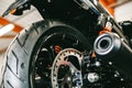 Front motorcycle disk breaks and tire in close up Royalty Free Stock Photo