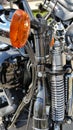 Front motorcycle suspension spring, fork and petrol tank