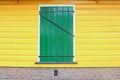 Front old Dutch house shutter window yellow walls, Netherlands Royalty Free Stock Photo