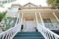 Front of old Victorian home, looking up from base of stairs to door Royalty Free Stock Photo