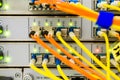 Front panel of the central router. Optical links of a powerful Internet server. Connection of optical wires in the data center Royalty Free Stock Photo