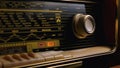 Front panel of vintage radio with frequency setting scale. Dashboard of an analog old radio close up. Royalty Free Stock Photo