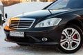 The front part of a black car of the executive business class of the brand Mercedes Benz, model amg on the street prepared for Royalty Free Stock Photo