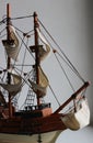 Front part and bowsprit of a wooden scale model of a masted sailing ship Royalty Free Stock Photo