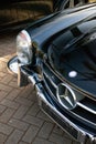 Front part of a classic retro Mercedes 300SL in closeup