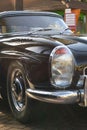 Front part of a classic retro Mercedes 300SL in closeup