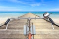 Front part of vintage bicycle. View from bikers eyes on wood bridge at the sea