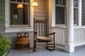 front porch of cape cod house, with rocking chair and lantern, providing a cozy and inviting space Royalty Free Stock Photo