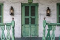 Front Porch with Green Door and Railing