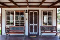 Front porch of a historic cabin in Australia.