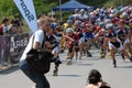 Racing on inline skates and running photographer