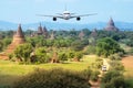 Front of real plane aircraft, on Pagoda Sunset in Bagan,Myanmar background Royalty Free Stock Photo