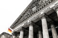 Front of the Reichstag building Bundestag in Berlin with German flag Royalty Free Stock Photo