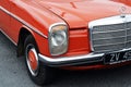 Front Right Side of a Red Classic Mercedes W115