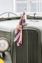 The front on a 1940`s world war two army car with a union jack flag on it Royalty Free Stock Photo