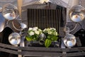 The Front of a Shiny Silver Wedding Car.