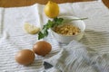 Front Shot of eggs, parsley, chickpeas, and lemons