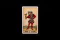 An individual minor arcana tarot card isolated on black background. Page of cups. Royalty Free Stock Photo