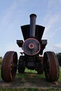 Front side of huge agricultural steam tractor displayed as exhibit in agricultural museum Royalty Free Stock Photo