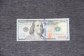 Front side of hundred dollar bill. One hundred dollars on gray background Royalty Free Stock Photo