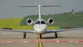 Front side of private jet plane landing at the international airport Danube Delta
