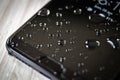 Front side of waterproof smartphone covered Royalty Free Stock Photo