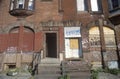 Front stoop of abandoned brick apartment, Philadelphia, Pennsylvania