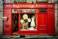 Dinan - France. Front store of shabby items, In red wood in Dinan. France