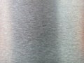 Front surface of steel, stainless steel, aluminum, back surface light gray, smooth, very fine, with light and reflection, soft red Royalty Free Stock Photo