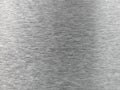 The front surface is steel, stainless steel, aluminum. The back surface is light gray, smooth, very fine, with light and soft refl Royalty Free Stock Photo