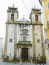 in front of the SÃÂ£o Bartolomeu church in the city of Coimbra.