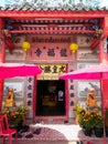 Front of Thai Chinese temple.Thai and Chinese language in image is name of temple and quotes about life.