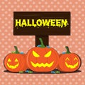 Front of three pumpkins have Halloween text on the background.Vector illustration. Royalty Free Stock Photo